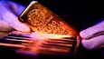 Gold eyes best monthly gain in over 50 years; silver breaks $120