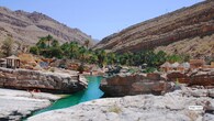 <strong>4. Wadi Bani Khalid – Emerald Pools All Year Round</strong><br />Unlike many wadis that dry up seasonally, Wadi Bani Khalid flows year-round, making it one of the most accessible and popular water spots in Oman. Its emerald-green pools are framed by date palms and rugged cliffs. While the main pools attract visitors, walking deeper into the wadi leads to quieter corners and hidden gorges that feel far removed from civilisation.