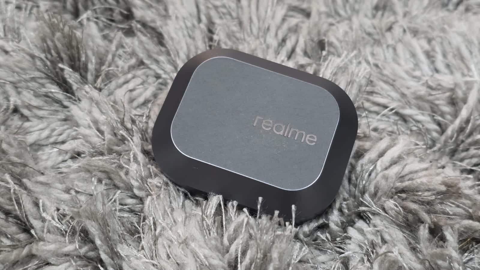 Design and comfort Design is where I feel Realme could have done better. The earbuds are fine, they fit snug and also include multiple tips to suit the needs. It is also light enough to not feel heavy in the long run. However, the case is something I think needs a little work. The lid has this textured material - feels good – gets less dirty. However, long term use could be a problem. But, that's the least of my concerns. The lid opening mechanism is a little tight for my liking and also feels a little slippery. Realme could have added a slightly rugged material at the bottom part to make it easier to open. Rest everything is functional as it should be.