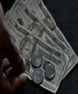 US economy grew sluggish 0.5% in fourth quarter, says govt; downgrading previous estimate