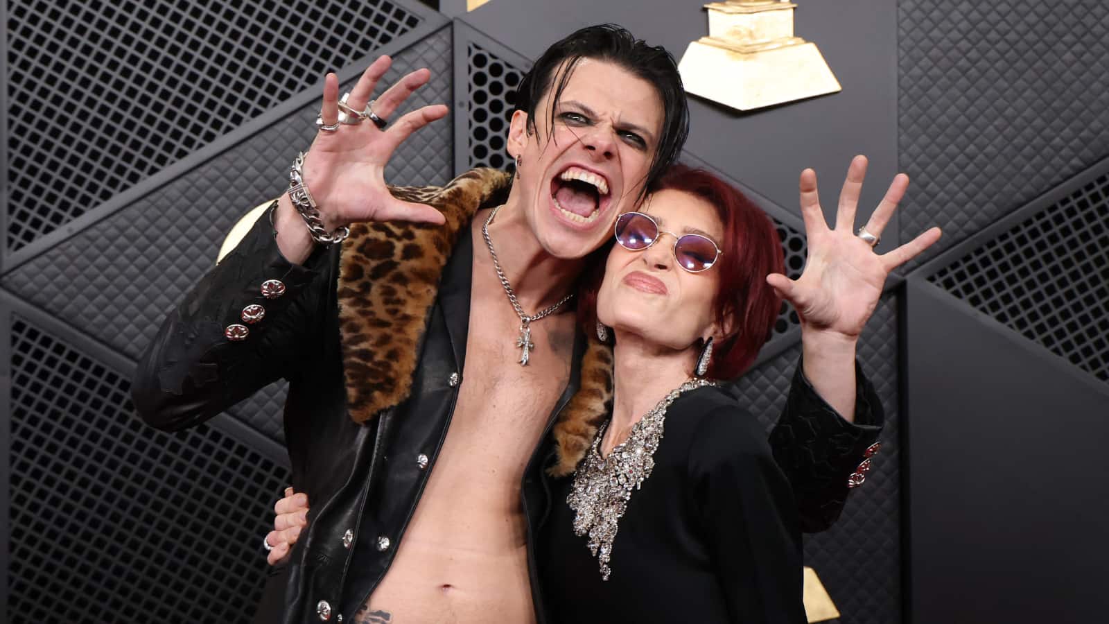 Sharon Osbourne with Yungblud at the red carpet during the 68th Annual Grammy Awards in Los Angeles. Sharon sported a long-sleeve black gown on the red carpet with a large silver floral necklace and orange-tinted sunglasses. (Photo: Reuters) 