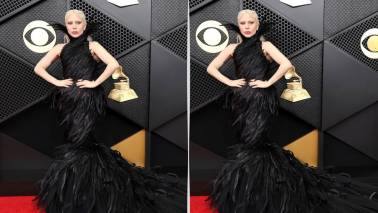 <strong>Lady Gaga</strong><br />Doesn't she look like a goddess in this gown? This black number is a custom feathered mermaid gown by designer Matières Fécales. Everyone has been admiring her look, and rightly so! It flatters her body completely. What's interesting to note is that it is a no-accessory look. (Picture Credit: Instagram)