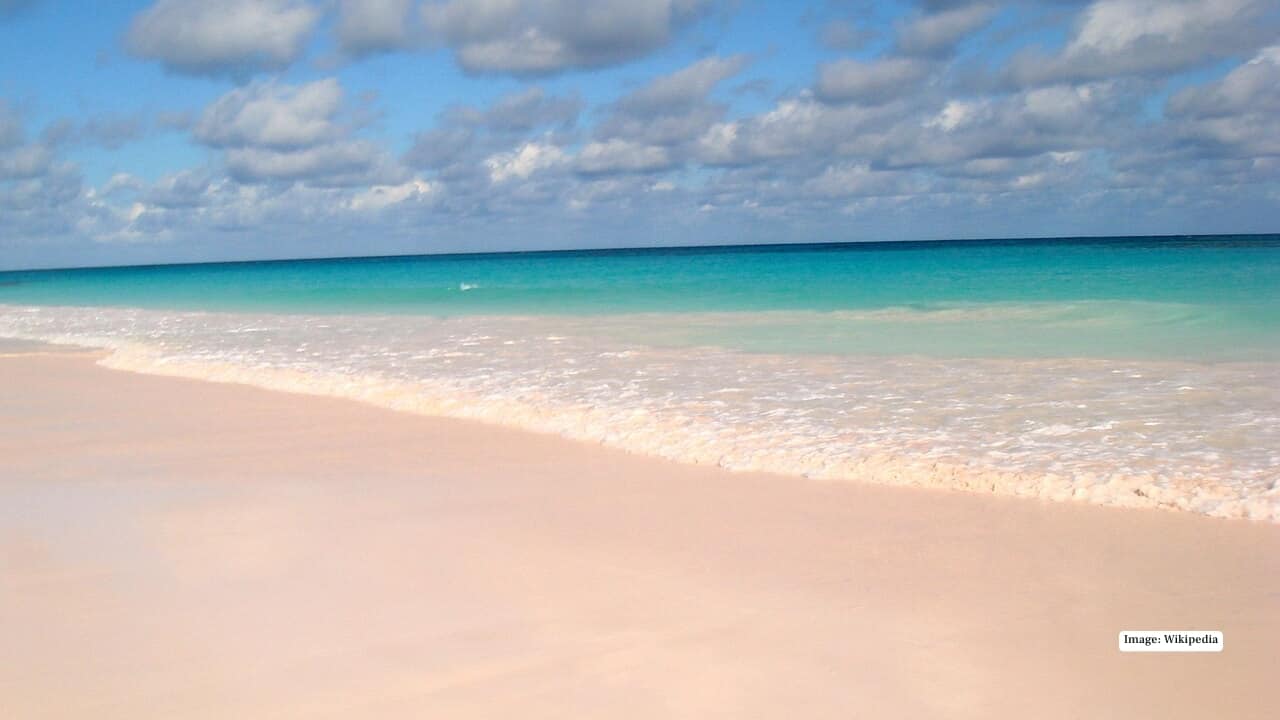 <strong>2. Pink Sands Beach – Harbour Island, Bahamas</strong><br />Soft, powdery pink sand stretches along this idyllic Caribbean island, tinted by microscopic organisms in the coral. The contrast with the turquoise waters makes it a photographer’s dream.