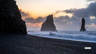 <strong>6. Reynisfjara Black Sand Beach – Iceland</strong><br />This dramatic beach is famous for its jet-black sand, powerful Atlantic waves, and towering basalt columns. A natural masterpiece of Icelandic geology, it’s both eerie and beautiful.