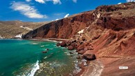<strong>10. Red Beach – Santorini, Greece</strong><br />Nestled against rust-colored volcanic cliffs, Red Beach’s terracotta-hued sand and clear blue waters create an iconic, almost painterly landscape. Its dramatic backdrop makes every sunset unforgettable.