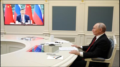 Xi, Putin hail ties in video call as Ukraine war nears anniversary

