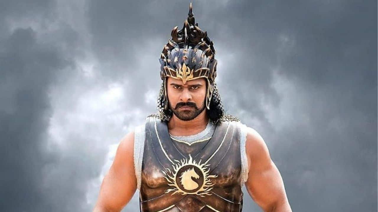 Baahubali: The Beginning &amp; The Conclusion This is the look that redefined Prabhas in Indian cinema and globally. From the sculpted physique to the regal armour, Baahubali wasn’t just a character — it was an image etched into pop culture. Every frame carried strength, honour, and sheer visual authority.