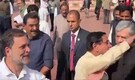Rahul Gandhi tries to grab Prahlad Joshi’s arm outside Parliament, minister pulls away: ‘Let’s do it together’ | Watch