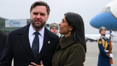 US Vice President JD Vance and US Second Lady Usha Vance walk toward a motorcade as they arrive at Heydar Aliyev International Airport in Baku, on February 10, 2026. (Photo by AFP)