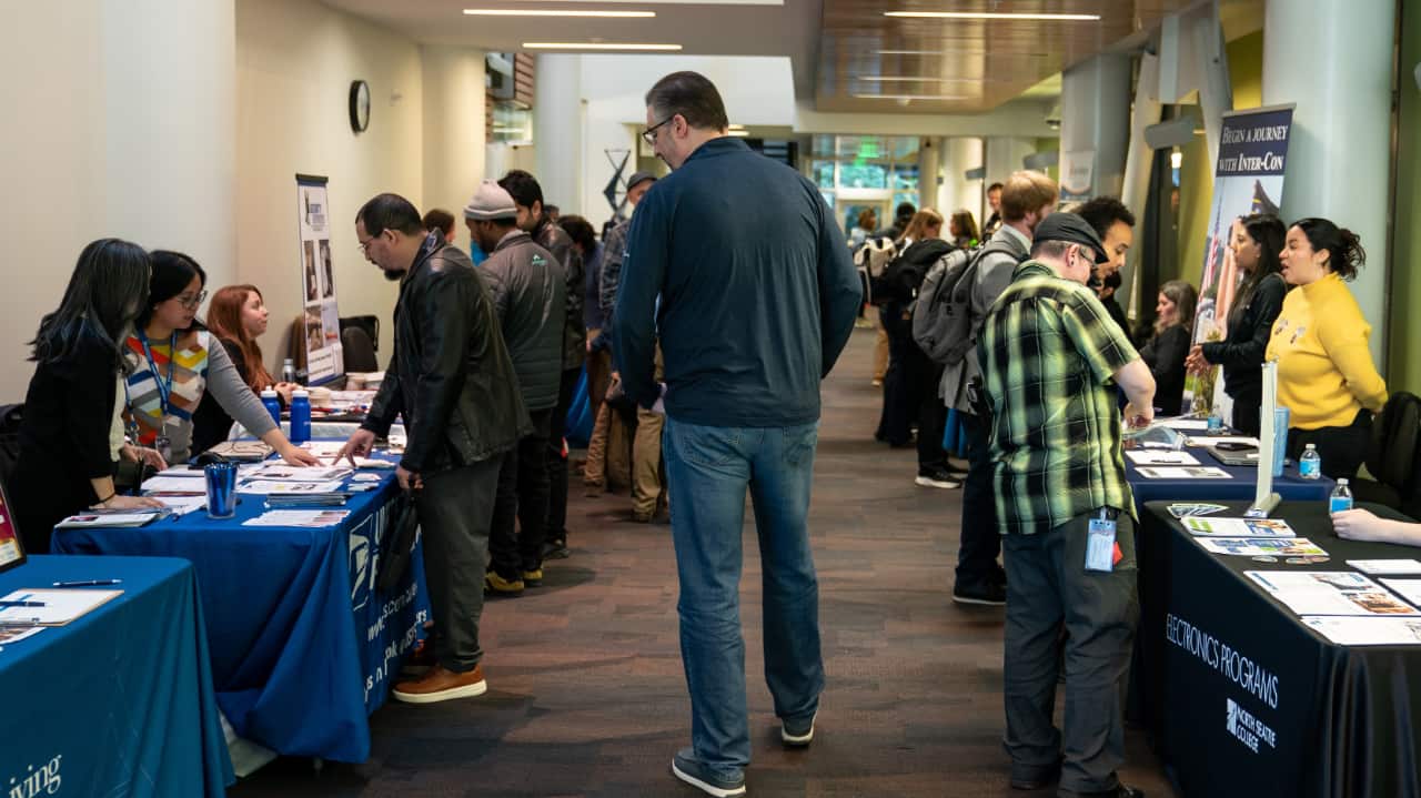 US adds 130,000 jobs and unemployment falls after tepid 2025