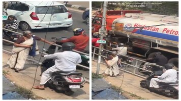Kerala elderly woman blocks scooty on footpath, teaches biker a civic sense lesson