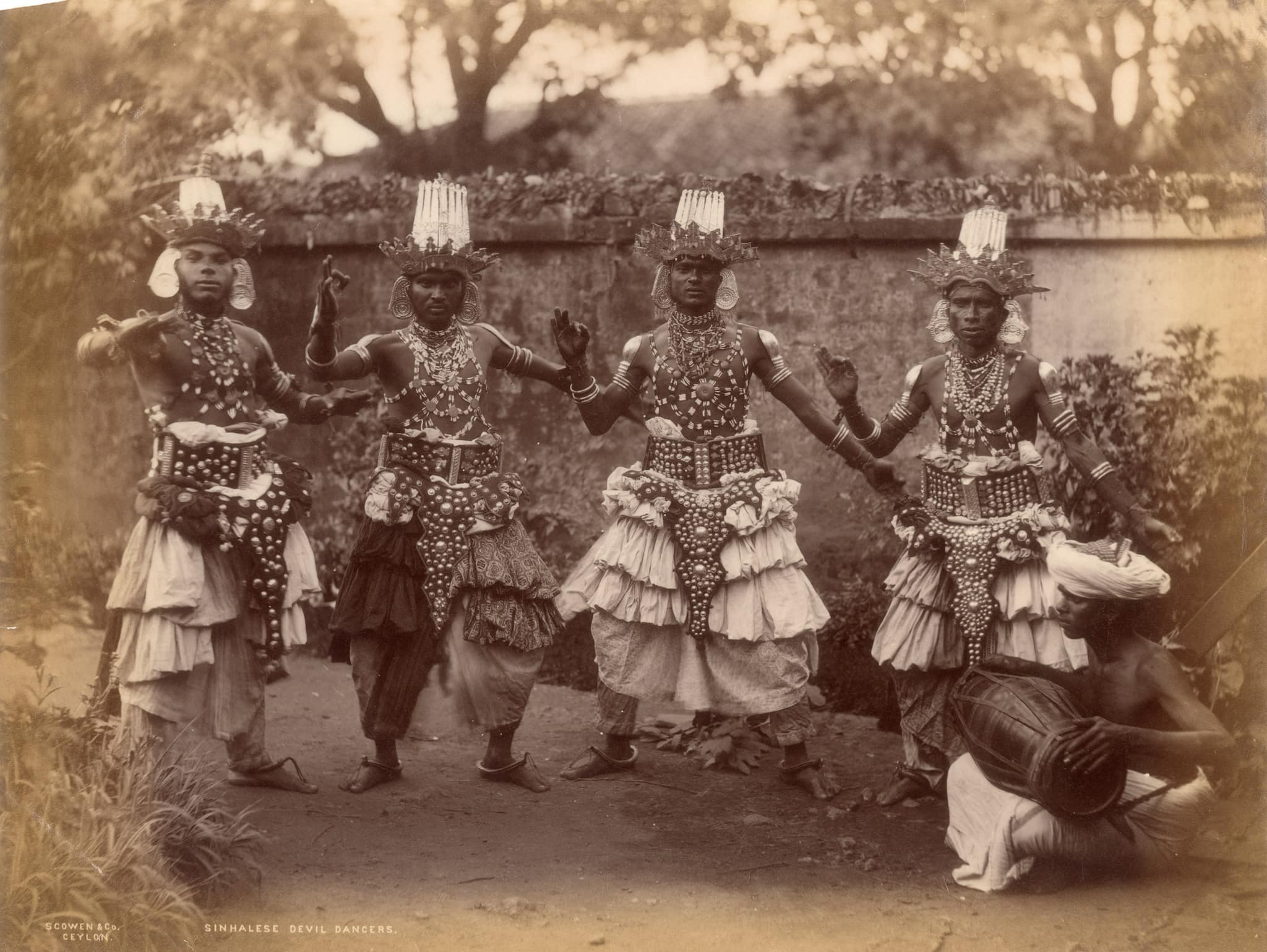 As a register of colonial anxieties and preoccupations, the photographs in ‘The People of India’ (1868 – 75) reveal a great deal. With 468 annotated photo illustrations across eight volumes, the ‘PoI’ series began as a way for the British to understand, categorise and potentially govern India and Indians better. That the ethnographic project grew out of a kind of response to India’s First War of Independence, is telling of how massive a blow the 1857 Uprising was to the British East India Company. An exhibition of photographs from the period — ‘Typecasting: Photographing the Peoples of India 1855 –1920’, drawn from the collection of Delhi art gallery DAG, on at Bikaner House in Delhi till February 15 — offers perspectives and arguments to re-examine these images, both as a lookback at the colonial project that occasioned them and as an alternative reading for what the images and their subjects themselves might reveal to us a century-and-a-half later. (Pictured here: Sinhalese Devil Dancers; silver albumin print on paper, c. 1880; by Scowen &amp; Co., courtesy DAG)