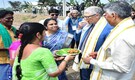 Bill Gates tastes Andhra snack punugulu during visit to Vijayawada, meets local farmers