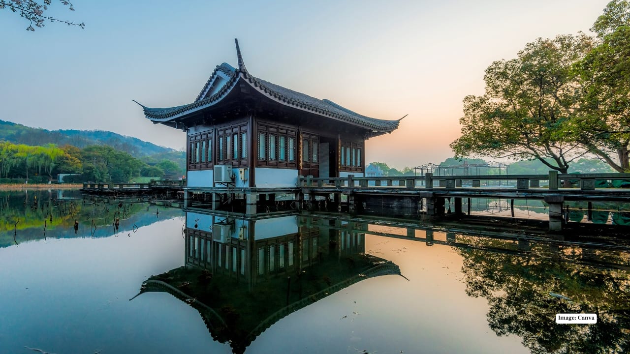 8. West Lake, Hangzhou West Lake offers a softer, slower side of China. Willow trees sway over stone bridges, pagodas punctuate the horizon, and small boats glide quietly across the water. Poets and painters have drawn inspiration from this landscape for centuries, and its timeless elegance remains intact despite the modern city surrounding it.