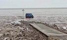 Amazon delivery van stranded on tidal mud flats after GPS sends driver onto historic coastal path