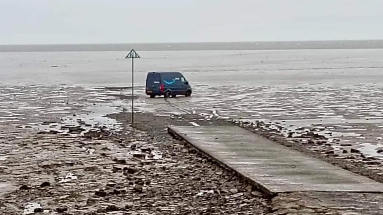 Amazon delivery van stranded on tidal mud flats after GPS sends driver onto historic coastal path