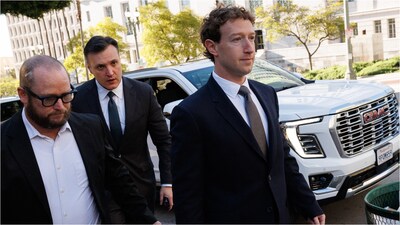 Meta CEO and Chairman Mark Zuckerberg (R) arrives at Los Angeles Superior Court ahead of the social media trial tasked to determine whether social media giants deliberately designed their platforms to be addictive to children, in Los Angeles, on February 18, 2026. (AFP)
