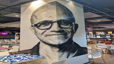 Walls in a Bengaluru mall features portraits of tech leaders like Satya Nadella, Sundar Pichai and Elon Musk.