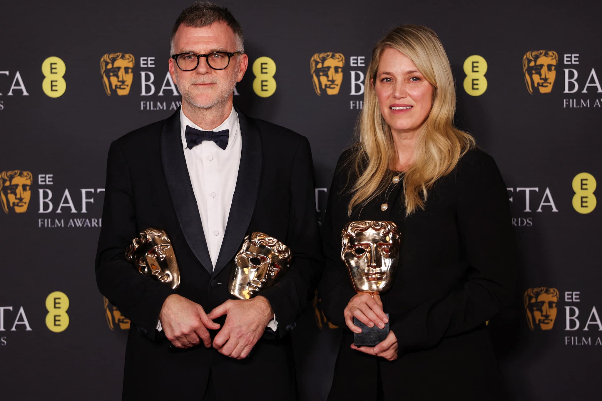 <strong>Director: Paul Thomas Anderson (One Battle After Another)</strong><br />Paul Thomas Anderson and producer Sara Murphy pose with the Bafta Best Director Award, Adapted Screenplay Award and Cinematography Award for 