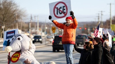 People protest against the planned project of converting a warehouse into a US Immigration and Customs Enforcement (ICE) detention center in Roxbury, New Jersey, on February 16. (Image credit: AFP)
