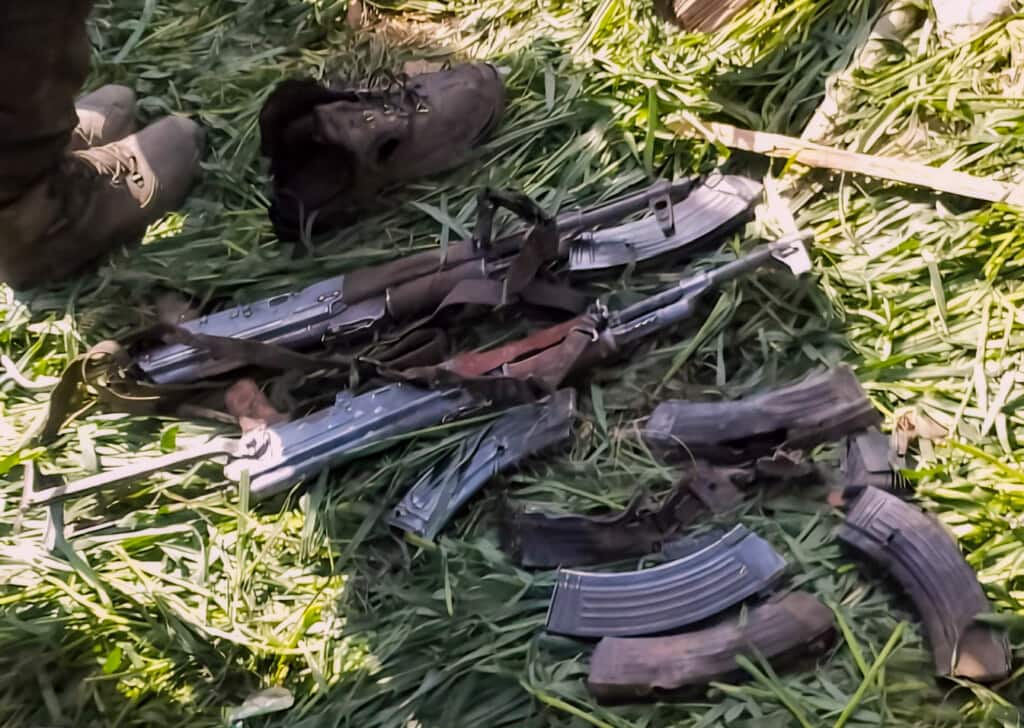 Arms and ammunition recovered from the site of an encounter between security forces and militants, in Kishtwar district.