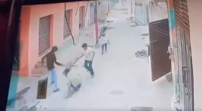Noida daylight murder caught on camera - man chased, pinned to ground and shot