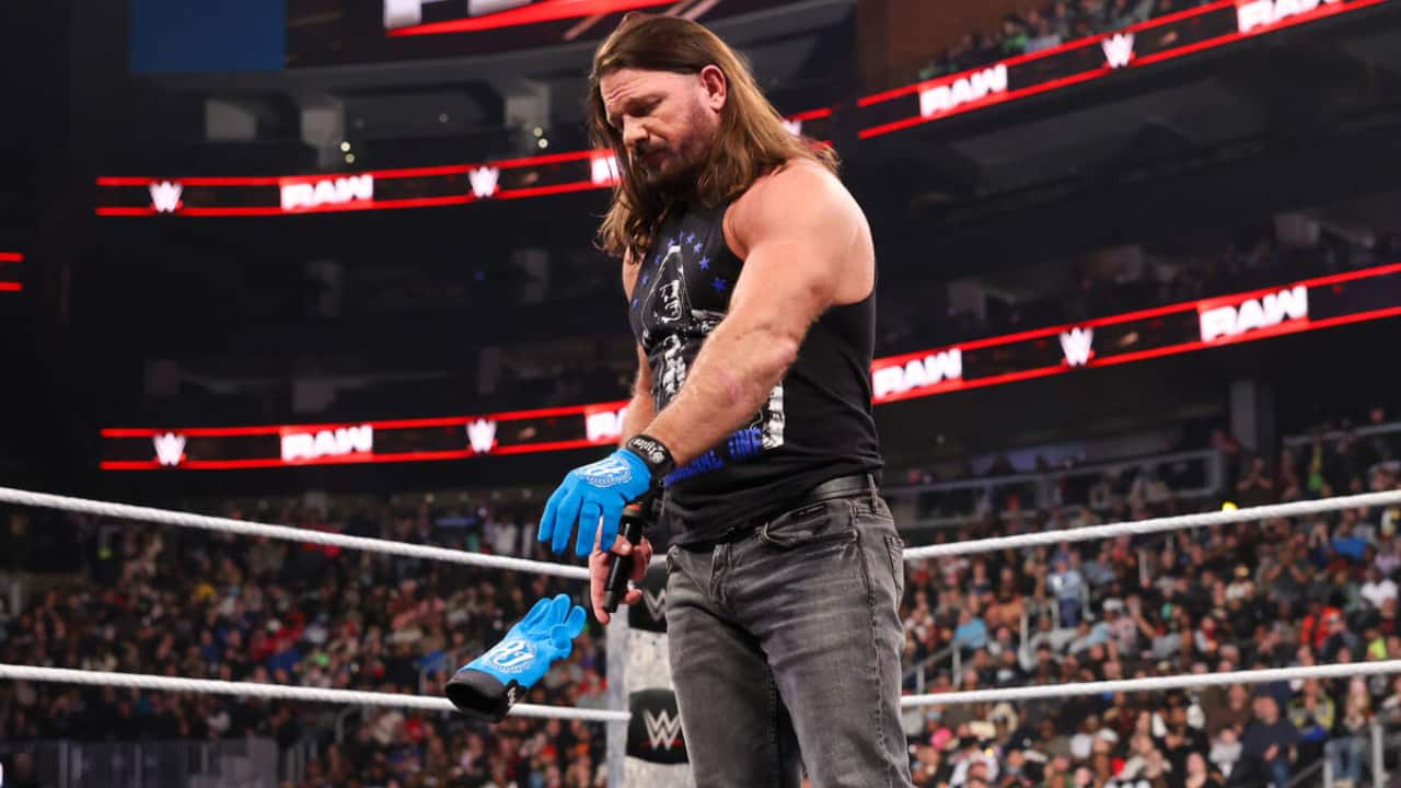 Then AJ Styles had left fans confused with his post-match gesture. He tried to place his gloves in the center of the ring but wore them back at the last moment. He finally revealed the motive behind it, explaining he had the desire to do it at Atlanta, Georgia - his hometown. (WWE Photo)