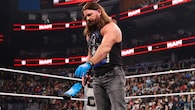 Then AJ Styles had left fans confused with his post-match gesture. He tried to place his gloves in the center of the ring but wore them back at the last moment. He finally revealed the motive behind it, explaining he had the desire to do it at Atlanta, Georgia - his hometown. (WWE Photo)