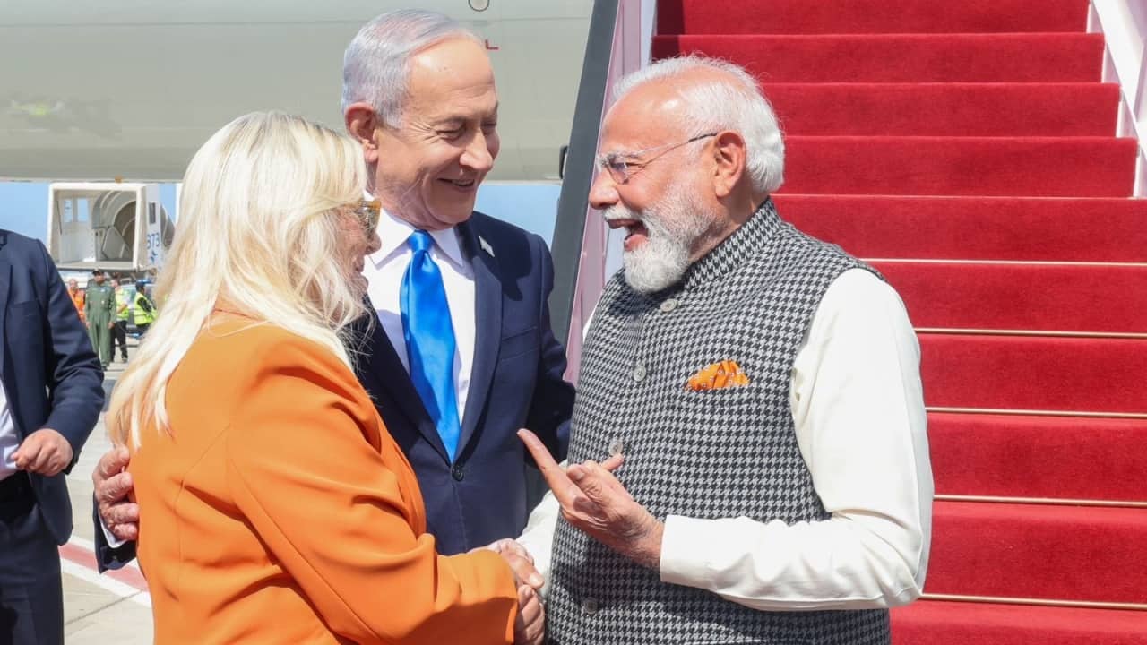 A saffron moment in Tel Aviv: Israeli PM spots ‘colour connect’ between PM Modi and Sara Netanyahu at airport welcome | WATCH