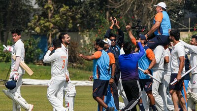 J&K players hoisted their head coach and sang his name after the semifinal win against Bengal (PTI Photo)
