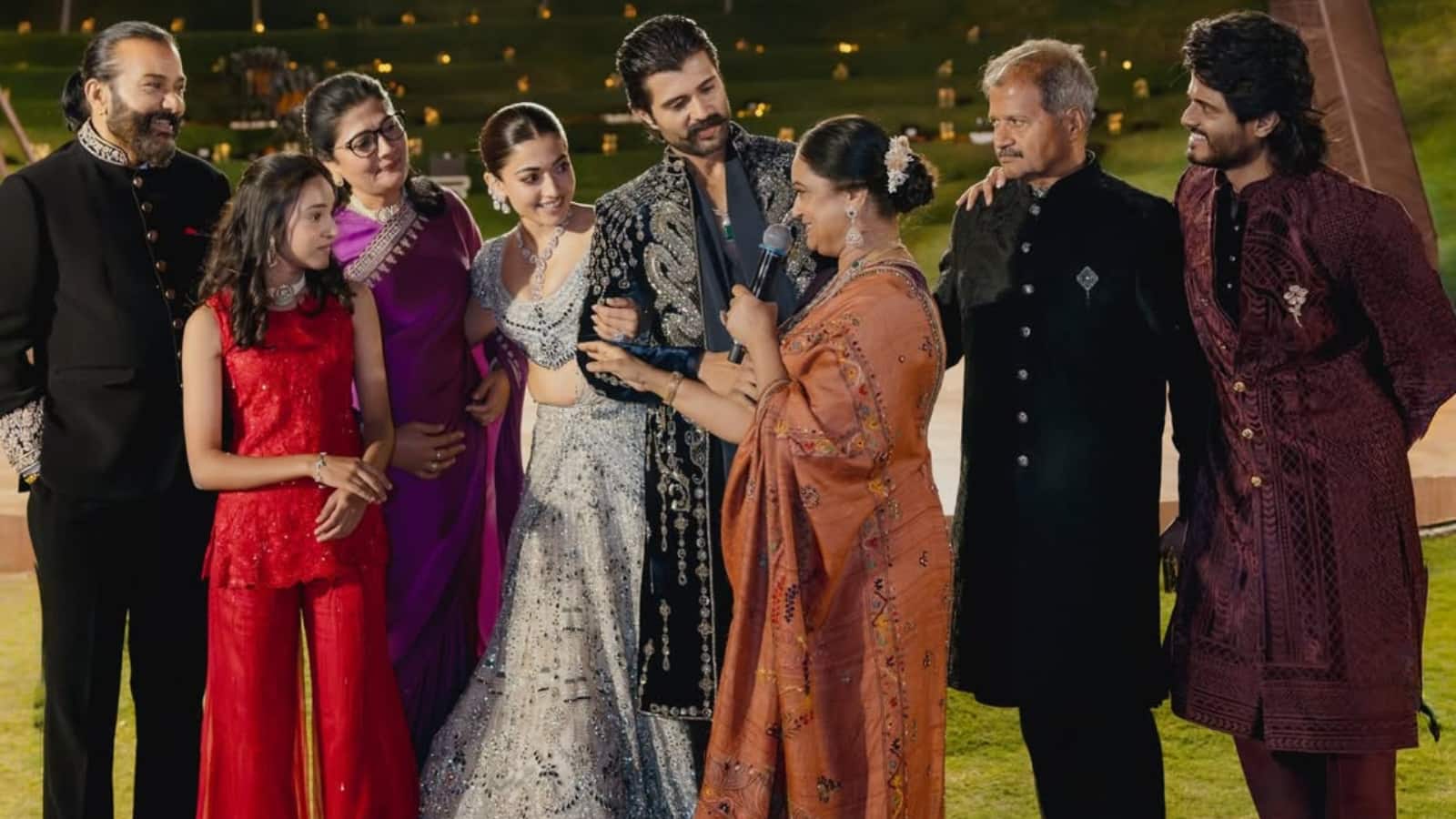 A moment with their families  Rashmika and Vijay look on as they pose with their parents. 