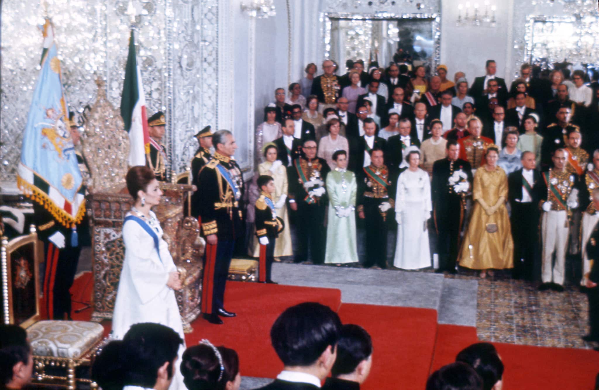 Picture shot 26 October 1967 during the coronation ceremony of Mohammed Reza Pahlavi (L) as Shah of Iran. At the left stands his wife princess Farah Diba. (Photo by AFP)