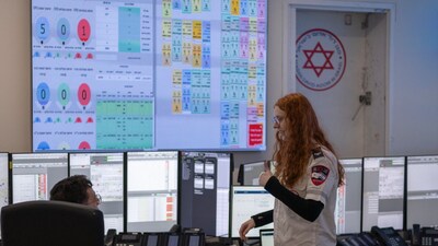 (Representative/AFP image. Israeli first responders work at the national MDA dispatch center in Ramla.)
