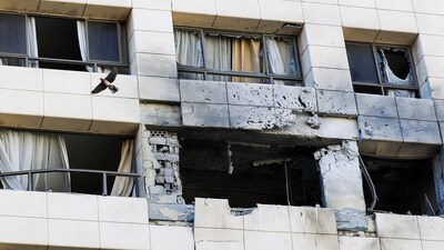 Damaged apartment in the Ramada Plaza hotel building in the aftermath of an Israeli strike, following an escalation between Hezbollah and Israel amid the U.S.-Israeli conflict with Iran, in central Beirut, Lebanon, March 8, 2026. REUTERS/Claudia Greco