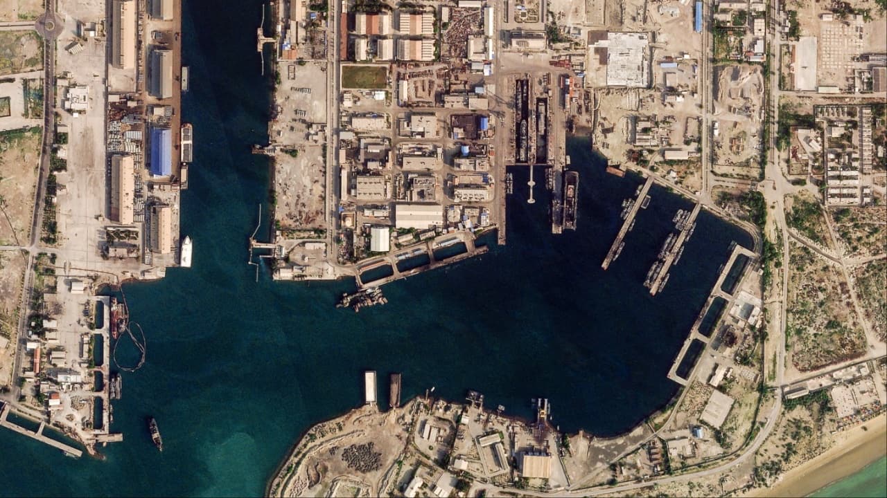 This handout satellite image taken by 2026 Planet Labs PBC shows damage at the military harbour in Iran's southern port of Bandar Abbas along the Strait of Hormuz on March 4. (Image credit: AFP)