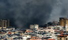 Dark ‘toxic rain’ falls over Tehran after airstrikes on oil depots | Watch