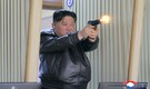 North Korean leader Kim Jong Un, daughter try out new pistols at shooting range | See pics