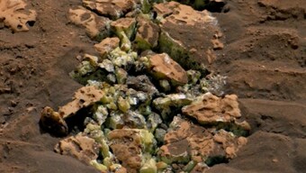 NASA's Curiosity wheel crushed a rock on Mars and revealed an unexpected yellow crystal — what happened next?