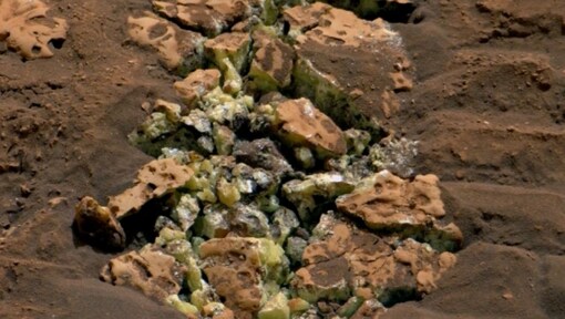 NASA's Curiosity wheel crushed a rock on Mars and revealed an unexpected yellow crystal — what happened next?