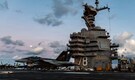 US carrier involved in Iran fight heads back to port after 'laundry room fire'