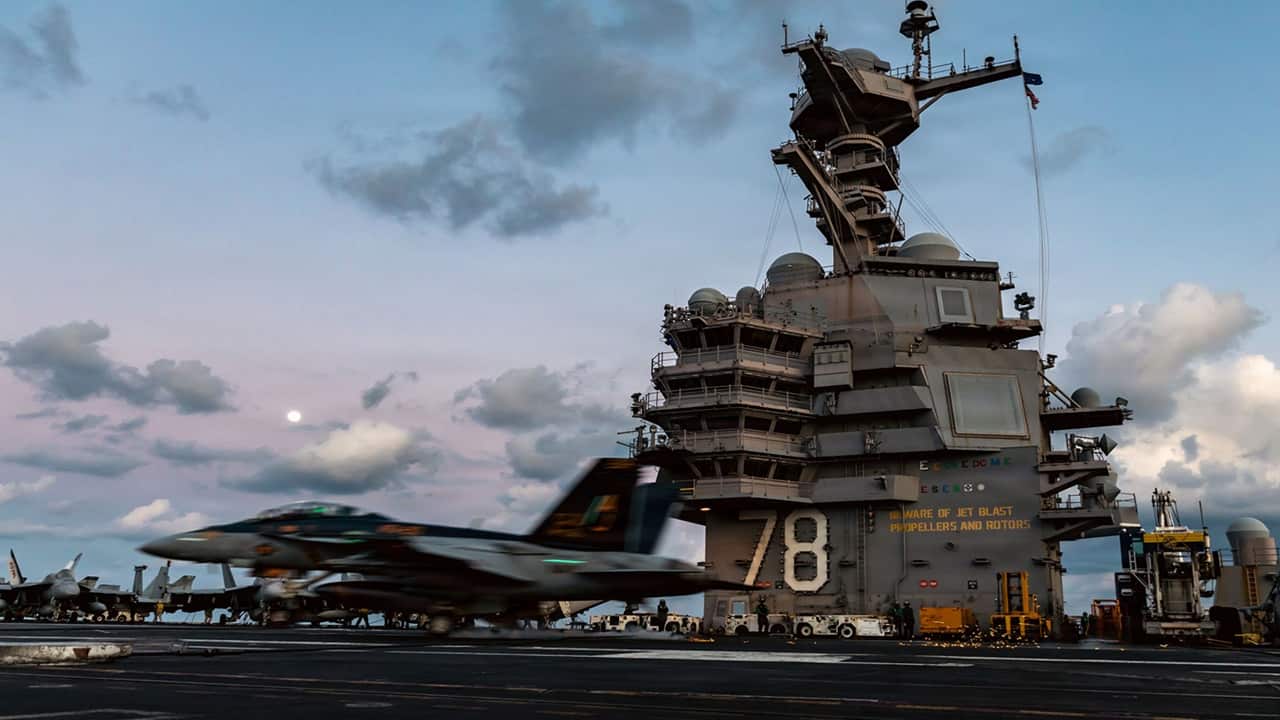 US carrier involved in Iran fight heads back to port after 'laundry room fire'