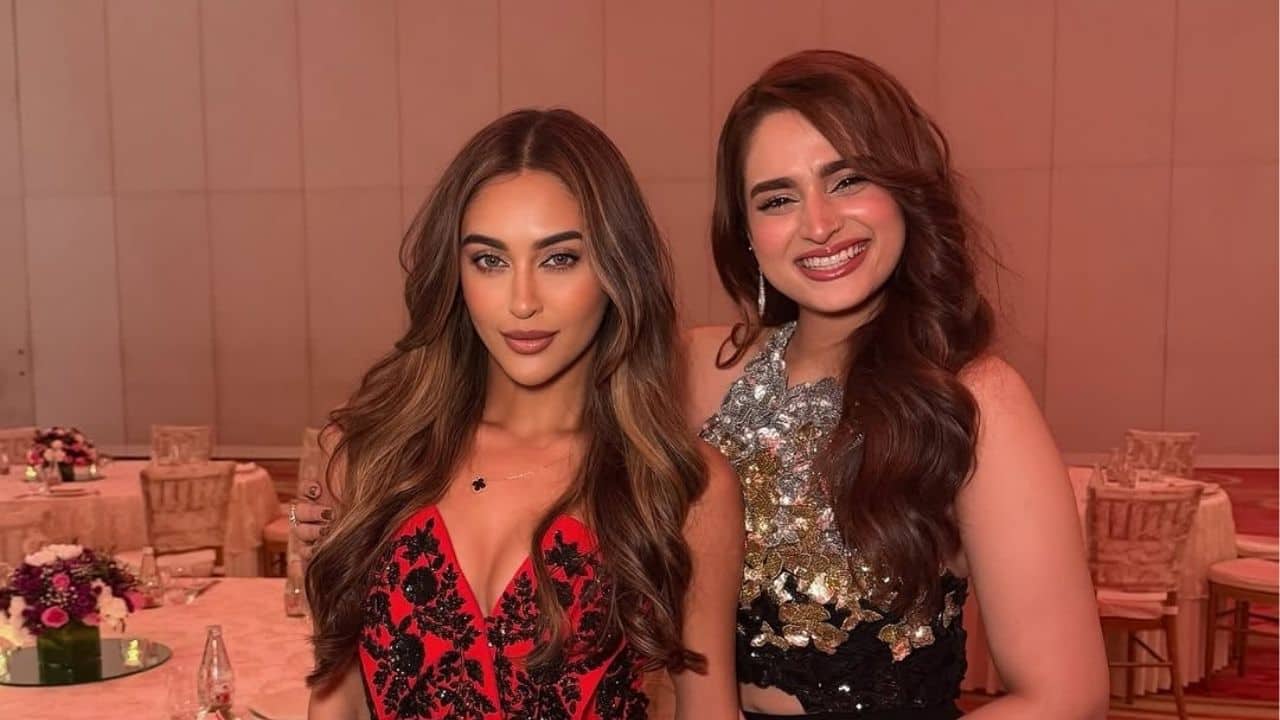 The sharaarat girls Ayesha Khan and Krystle D'souza pose together, serving glamour in contrasting outfits. Their smiles and effortless chemistry add to the celebratory vibe of the night.