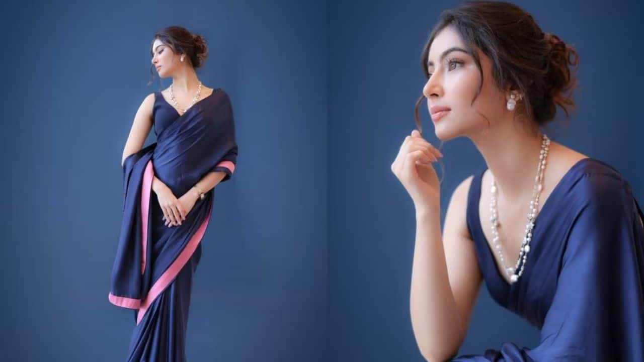 <br />Modern Minimal Chic<br />In a navy blue drape with subtle styling, Sara embraces a more contemporary and understated vibe. The clean silhouette, pearl jewellery, and soft makeup highlight her natural features. It’s a perfect blend of elegance and modern sophistication.