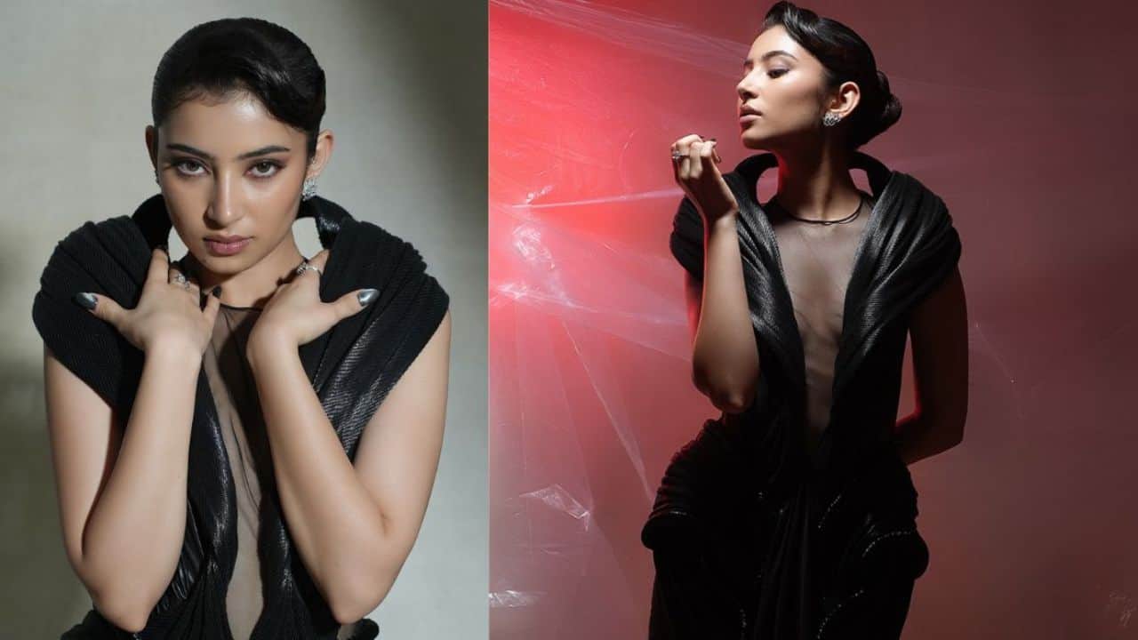 Edgy Glam Transformation<br />Sara’s bold black outfit marks a striking departure from traditional styles. With a structured silhouette, sleek hair, and sharp makeup, she channels a high-fashion, edgy persona. This look reflects versatility and a strong modern character arc.