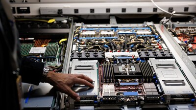 Mark Carroll, Director of Engineering at Amazon Web Services Annapurna Labs, places his hand on a compute sled of the new Trainium3 system at Annapurna Labs in Austin, Texas, on February 3, 2026. (AFP image used for representation)