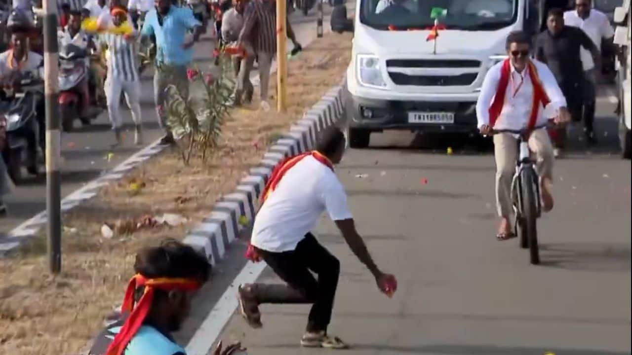 TVK chief Vijay leaps off bicycle at Kanyakumari rally as flower ball ignites scare and viral storm | Watch