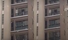 'Be careful who...': Woman throws Rs 1.5 crore cash from high-rise apartment, residents rush to collect