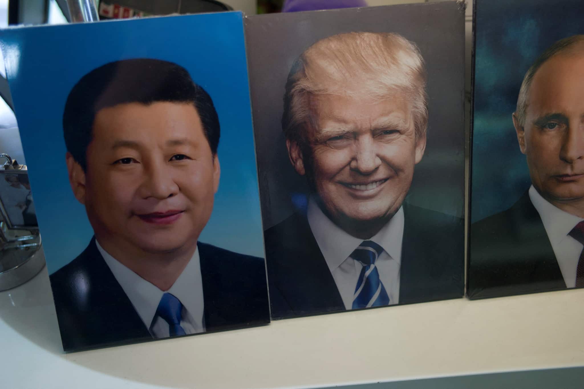Two superpowers, one capital: Beijing walks a diplomatic tightrope between Trump and Putin
