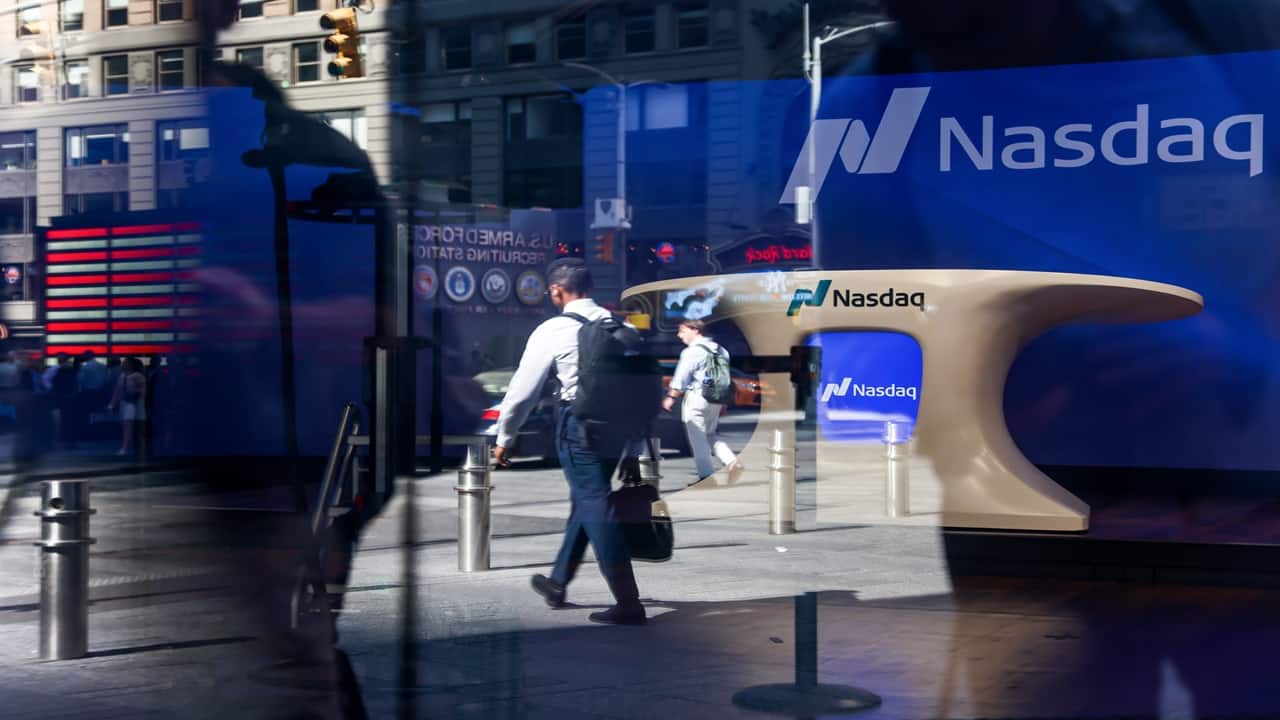 US stocks end week on up note, Nasdaq 100 snaps five-day slump