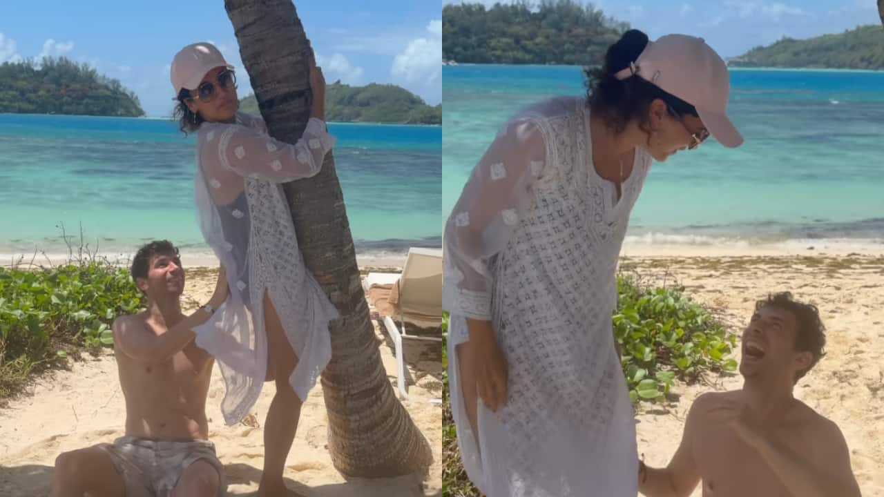 Taapsee Pannu's husband Mathias Boe struggles to help her strike a beach pose; actress says 'could've used AI"